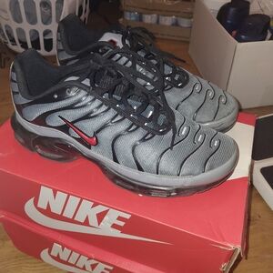 Nike Gray and Black Athletic Shoes with Red Accents